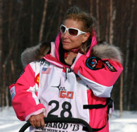 Dee Dee Jonrowe leaves Willow after the official start of the 2013 Iditarod. Photo by Rhonda Edge.