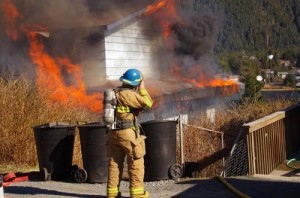 Sitka firefighter Parker White was one of 18 firefighters to respond to Saturday’s fire in the 400 block of Hemlock Street. (Photo by Roberta White/Sitka Fire Department)