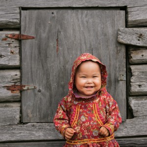 Young Yup'ik girl, Shaylene Spein, in traditional kuspuk, Kwethluk, Alaska.