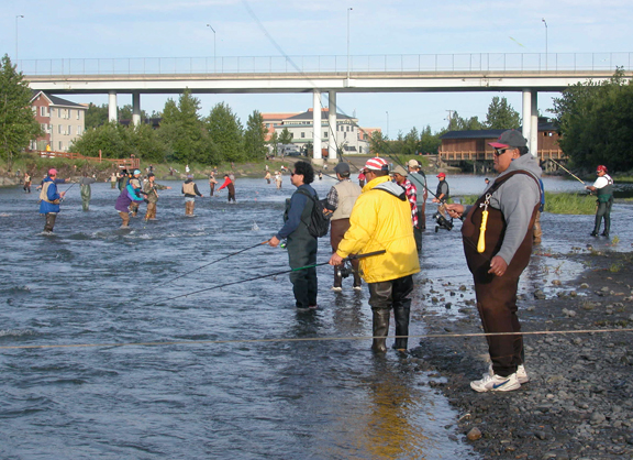Combat fishermen line the banks where Ship Creek's great run of king salmon then run the gauntlet in 2007.