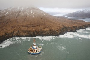 The Kulluk remains grounded and upright with no evidence of sheen in the vicinity on Friday, Jan. 4. The rig grounded in high seas and strong winds Dec. 31, 2012, and a full-scale response and recovery involving the U. S. Coast Guard, Shell, the State of Alaska, local governments and private contractors has been underway since then. Photo by Judy Patrick