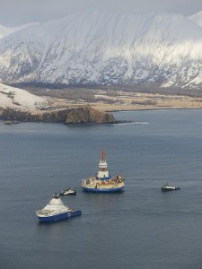 The drilling unit Kulluk, towed by the anchor-handling vessel Aiviq, heads to its safe harbor location in Kiliuda Bay. Photo courtesy of Shell Alaska.
