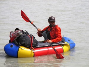 Luc in his pack raft.
