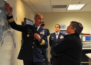 Rear Adm. Thomas Ostebo, commander District 17, explains Coast Guard operations in the Arctic and the distances covered by Coast Guard assets throughout Alaska to Secretary of Homeland Security Janet Napolitano, Monday, Aug. 5, 2012. Courtesy, by Petty Officer 3rd Class Jonathan Klingenberg.