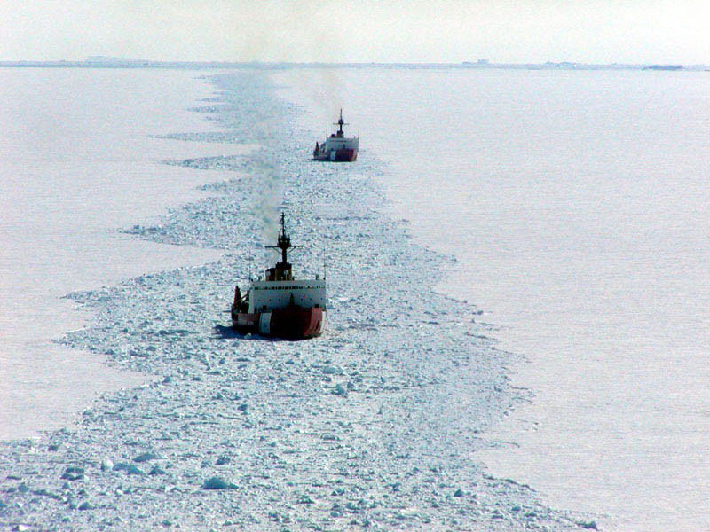 The heavy ice breakers Polar Star and Polar Sea create an access channel for supply ships in McMurdo Sound, during the 2002 Deep Freeze Mission. The Polar Sea is now in caretaker status and could be decommissioned. The Polar Star has undergone a thee-year $90 million overhaul. Courtesy U.S Coast Guard.