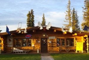 The Burnt Paw & Cabins Outback, located next door to Tok's Westmark Hotel, is a popular attraction for the tourists riding on the Holland America buses traveling to and from Dawson City, Yukon Territory. Photo by Nancy Arpino.
