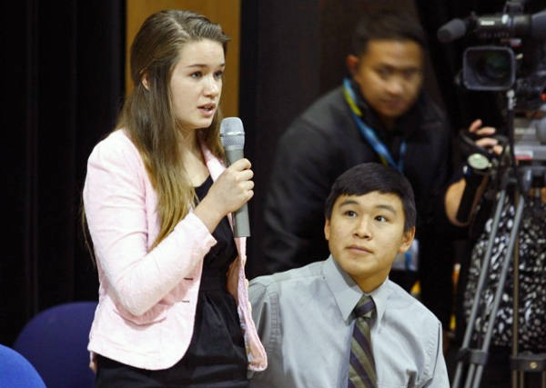 Katherine Dolma answers a question following a Supreme Court LIVE hearing at Barrow High School. Dolma and Nelson Kanuk, seated, are two of the six young plaintiffs in the case. Photo by Jeff Seifert, KBRW - Barrow.