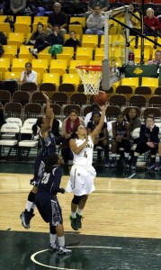 UAA's Alli Madison goes in for a layup against Georgetown in the Great Alaska Shootout championship. Photo by Josh Edge, APRN - Anchorage.