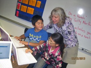 Alaska's Teacher of the Year 2014 Denise Lisac with DES fourth graders Morgan Allen and Laci Andrew.Photo by Shannon Clouse.