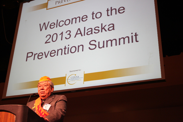 Alaska Native Brotherhood grand president Bill Martin speaks during opening remarks of the Prevention Summit sponsored by the Council on Domestic Violence and Sexual Assault. Photo by Lisa Phu, KTOO - Juneau.