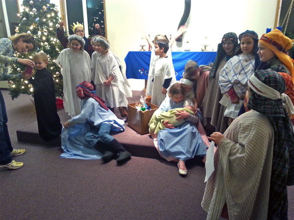 The cast of the living nativity after the show. Photo by Annie Ropeik, KUCB - Unalaska.
