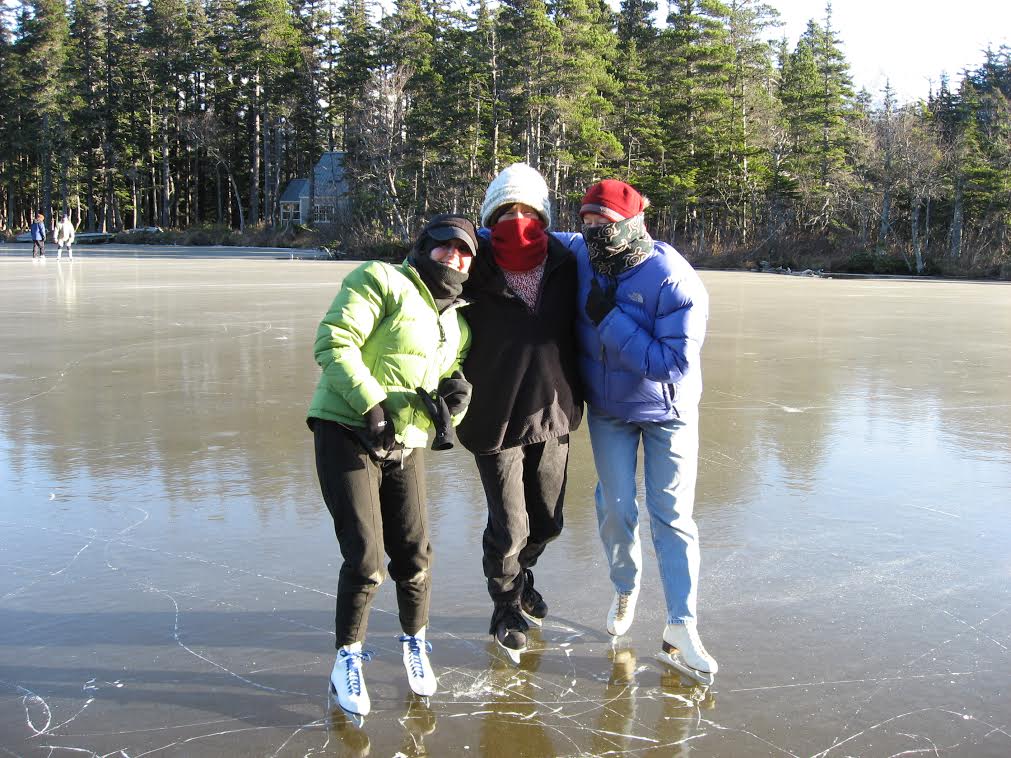 Mira Erickson, Jeanne Kitayama and Sandy Barclay skating on Rutzebeck Lake south of Haines. Photo courtesy Tom Morphet.