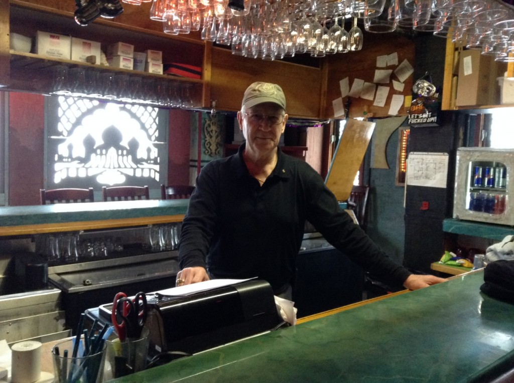 Mike Gordon, behind the bar at Chilkoot Charlie's.