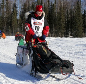 Aliy Zirkle heads out of Willow at the start of the 2014 Iditarod. Photo by Josh Edge, APRN - Anchorage.