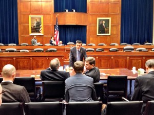 Rep. Darrell Issa, standing, chats with Alaska Congressman Don Young and Sen. Mark Begich before the hearing.
