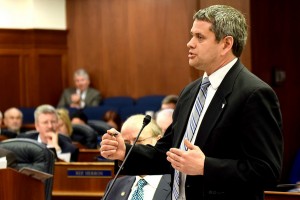 Rep. Chris Tuck addresses a joint session of the Alaska Legislature during debate about confirmations of the governor's appointees, April 17, 2014. (Photo by Skip Gray/Gavel Alaska)