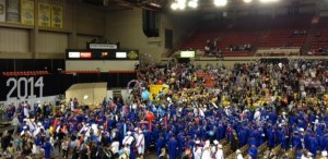 East High graduates celebrate after flipping their tassels.