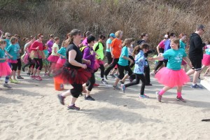 Every runner in Girls on the Run has a running buddy who stays with them for the entire 5K. (Photo by Lisa Phu/KTOO)
