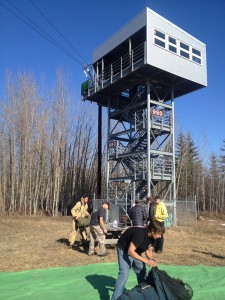 Smoke jumpers train to manage malfunctions on a zip line. (Photo by Emily Schwing, KUAC - Fairbanks)