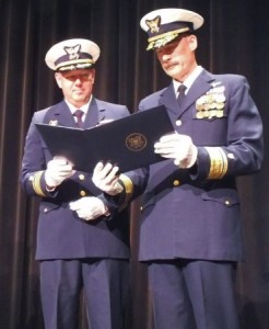 Rear Admiral Thomas Ostebo (right), commander of the U.S. Coast Guard’s 17th District recognizes outgoing Sector Juneau commander Capt. Scott Bornemann at a change of command ceremony on Friday. (Photo by Casey Kelly/KTOO)