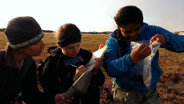 Young Barrow scientists study lemmings and endangered species. Photo courtesy of U.S. Fish and Wildlife Service.
