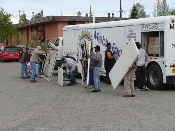 Volunteers set up for a Mobile Food Pantry in Anchorage.