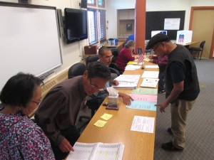 Voters at the Lower Kuskokwim School District choosing primary election ballots on Tuesday, August 19th, 2014.