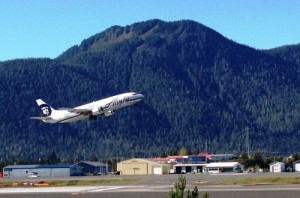 A southbound Alaska Airlines jet takes off from Petersburg’s airport Sept. 13, 2014. Some of the airline’s fares have been reduced and other price cuts may be coming. (Ed Schoenfeld, CoastAlaska News)