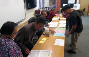 Voters at the Lower Kuskokwim School District choosing primary election ballots on Tuesday, August 19th, 2014.