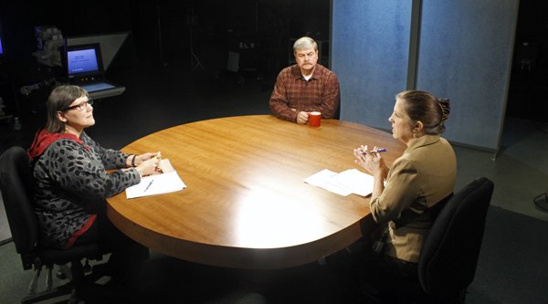 Valeri Davidson (left) and Walt Monegan (middle), talk with host Lori Townsend (right) on Alaska Edition. (Photo by Josh Edge, APRN - Anchorage)