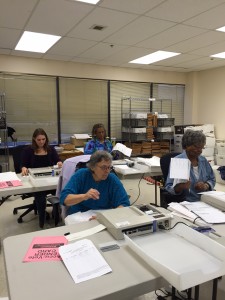 Workers at the Division of Elections scan early, question, and absentee ballots. Hillman/KSKA
