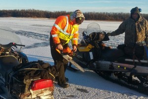 Search and rescue crews used chainsaws to cut the ice open during their search. (Photo courtesy of BSAR)