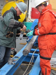 Chief scientist Brian Edwards collecting samples from the gravity corer. (Photo by Helen Gibbons, USGS/ECS Project)