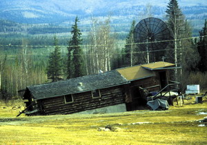 House sinking due to melting permafrost (Credit kml.gina.alaska.edu)