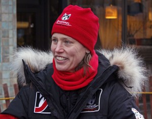 Aliy Zirkle greets fans at the ceremonial start of the 2013 Iditarod in Anchorage. Photo by Josh Edge, APRN – Anchorage.