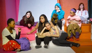 The cast of "Emotional Creature" listens to Rashid tell a story. Photo courtesy of Frank Flavin.