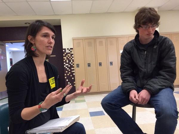 Regan Brooks teaches about storytelling as Service High student Kevin Goodman listens. Hillman/KSKA