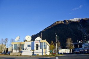 Juneau’s KTOO building houses radio, online and TV operations funded in part by the state. Legislative budget cuts will hit public broadcasters throughout the state beginning in July. (Photo by Heather Bryant/KTOO)