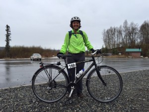Anne at the halfway point. Photo courtesy of another biker who was willing to knell in the rain with her iPhone.