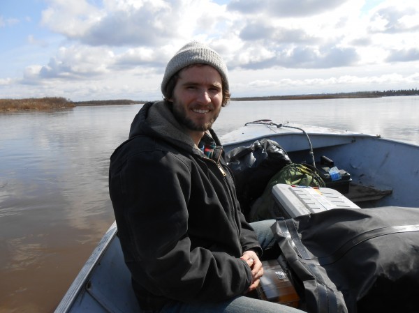 Sean Brennan doing research on the Nushagak River. Credit UAF