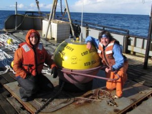 Angie Doroff of the Kachemak Bay Research Reserve and Kris Holderied of NOAA's Kasitsna Bay Laboratory with Bandit the Buoy