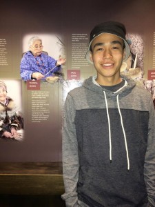Byron Nicholai in the American Indian Museum in front a a picture of his grandmother. -Photo courtesy of Bryon Nicholai.