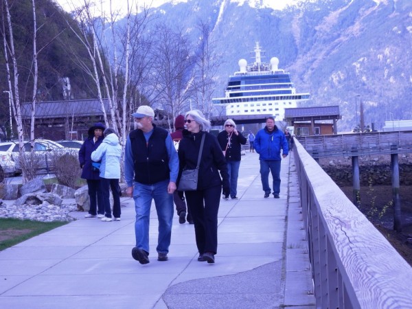 Tourists walk from the Celebrity Solstice towards town. (Emily Files)