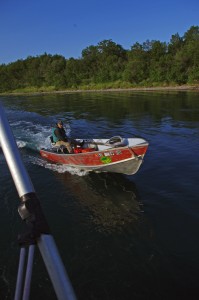 Blueberry Island Lodge owner George Riddles brings his skiff alongside the F/V Eagle Claw June 17, 2015, before hopping on board to help gillnetters navigate the Kvichak River braids.