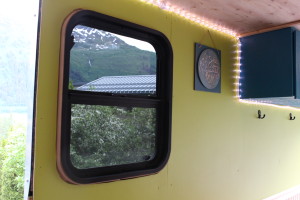 Window installation wasn’t easy in the 98-square-foot trailer. (Photo by Elizabeth Jenkins/KTOO)