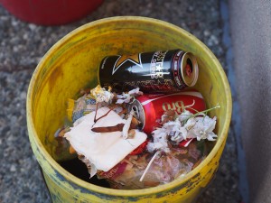 Each day, the trash gives a glimpse of what happened the night before. Today the crew removed a bottle of Crown Royal whisky, dime bags, and emergency contact cards from a nearby teen center.