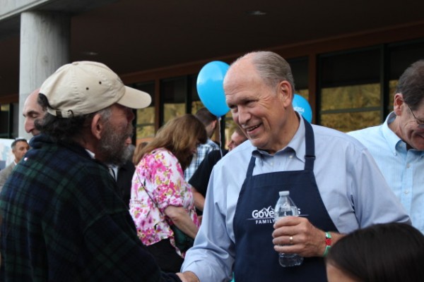 Walker greets people at his first Juneau Governor's Picnic. (Photo by Elizabeth Jenkins/KTOO)