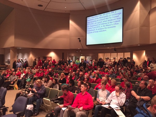 Mobilized by a coalition of faith groups, opponents of the measure wore red. 