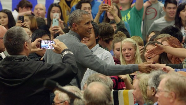 Obama greets gradeschool-aged children at the Dillingham School. Photo: Tara Young
