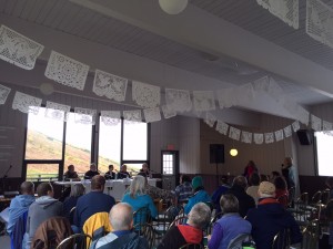An interfaith panel on climate change spoke Saturday at Alpenglow Lodge in Arctic Valley. (Hillman/KSKA)